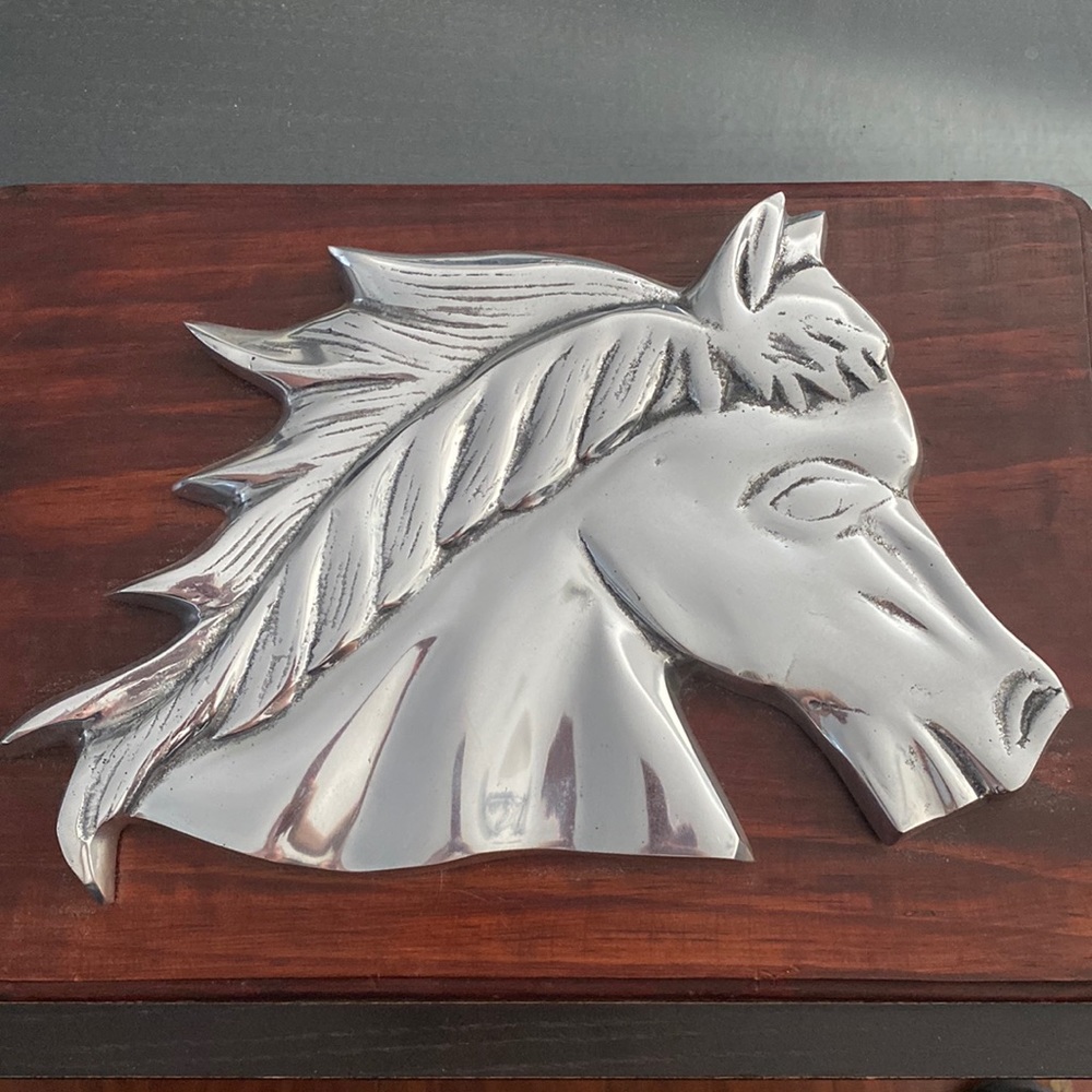 Argentinian pewter horse on wooden plank